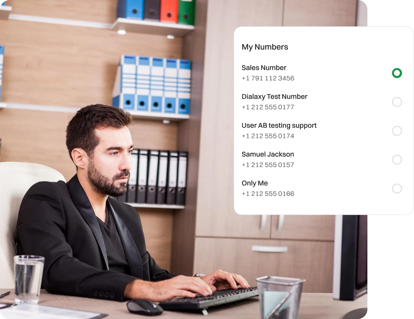 A gentlemen setting up phone numbers for handling concurrent calls.