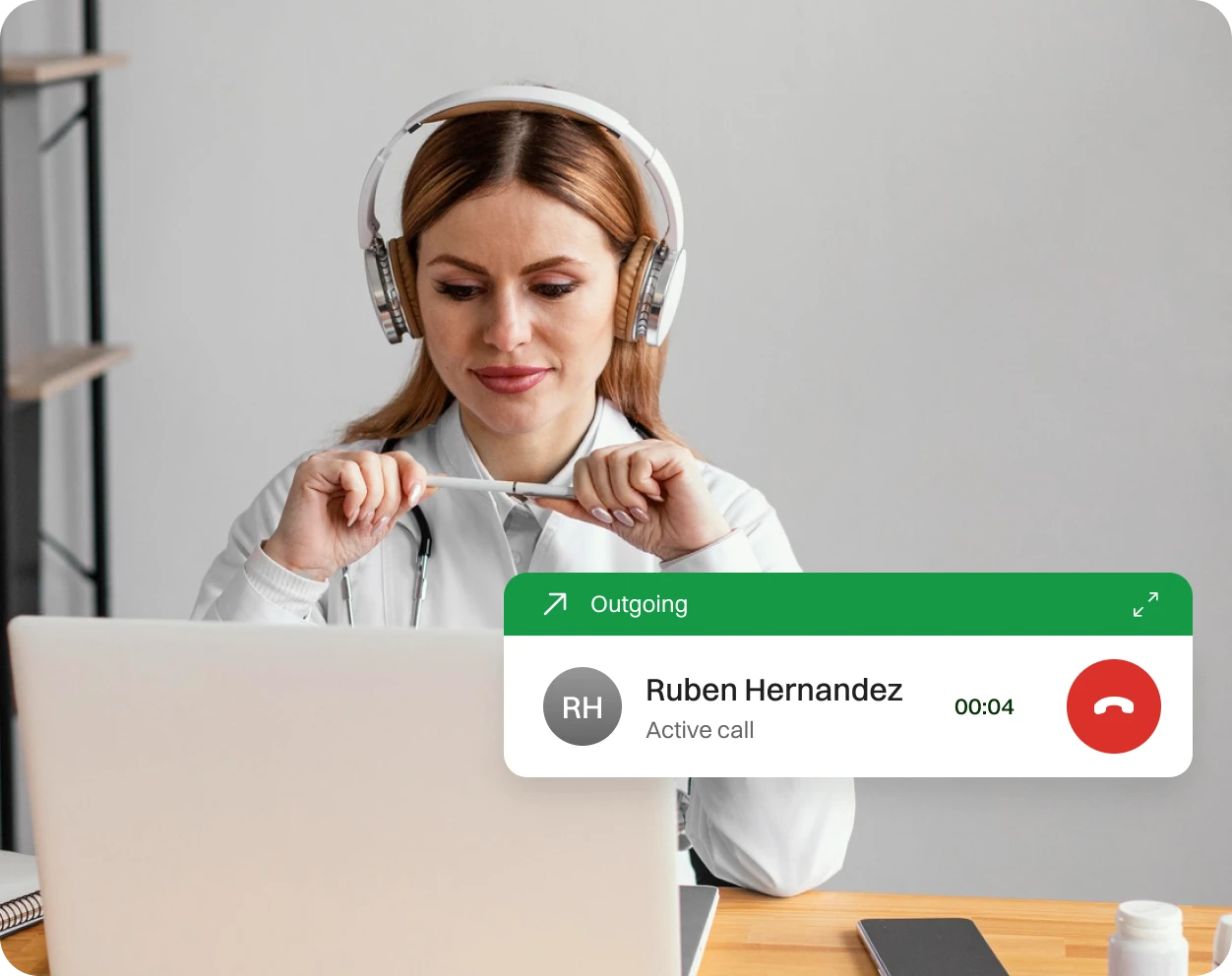A Lady engaging in a outgoing call made through Dialaxy App.