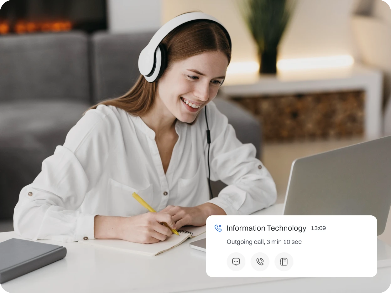 A girl student indulging in a call with Information technology faculty.