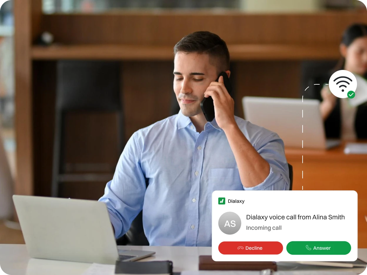 A male real estate agent about to receive incoming voice call from Alina Smith.