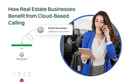 A women standing by holding a mobile phone on her hand and having conversation.