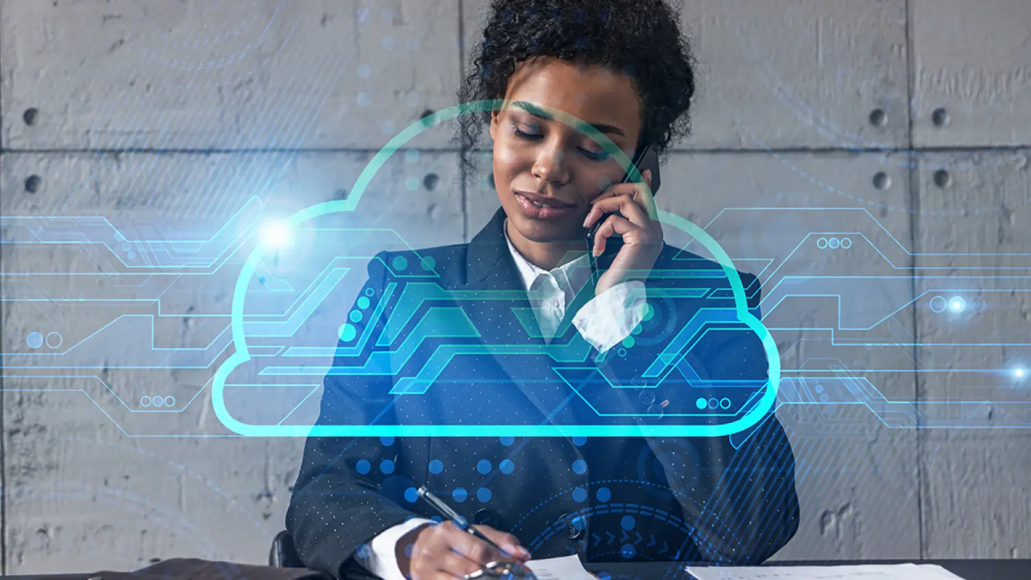 Businesswoman talking on a smartphone with a digital cloud computing graphic overlay, representing cloud communication or VoIP technology.
