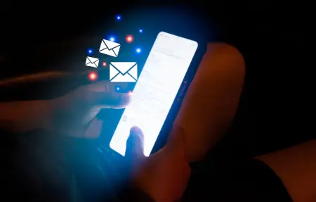 Smartphone glowing with message icons symbolizing SMS gateway for business communication