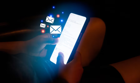 Smartphone glowing with message icons symbolizing SMS gateway for business communication