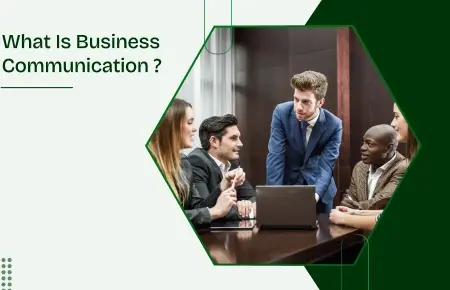 The image is group of people discussing about business on a round table looking on a laptop.