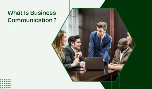 The image is group of people discussing about business on a round table looking on a laptop.